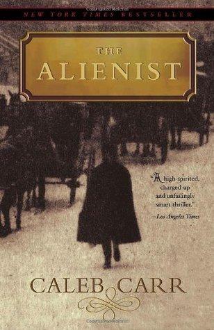 Book cover of the Alienist. A sepia background of multiple horse and carriages.  A man in a cape is walking contradictory to the horse and carriages. 