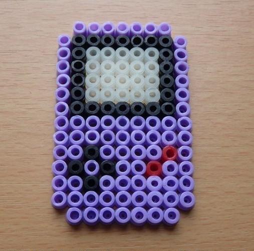 a retro Gameboy is stylized in fuse beads